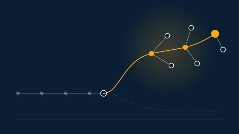 Abstract amber trace path branching away from a fading grey trace path on a dark navy background
